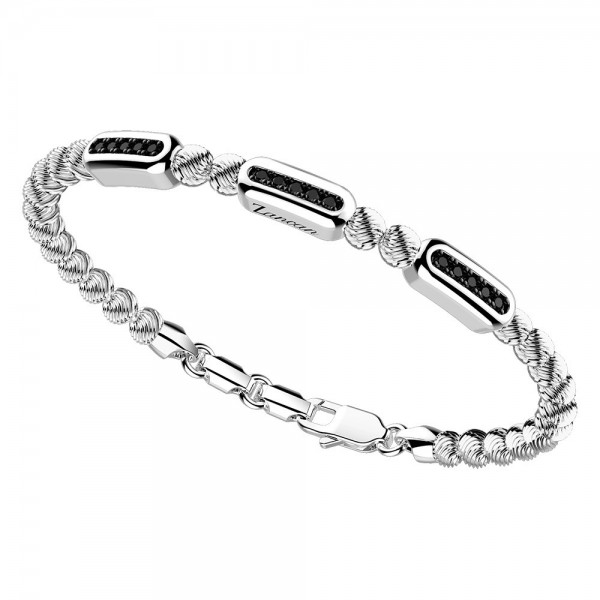 silver  bracelet and black spinels.