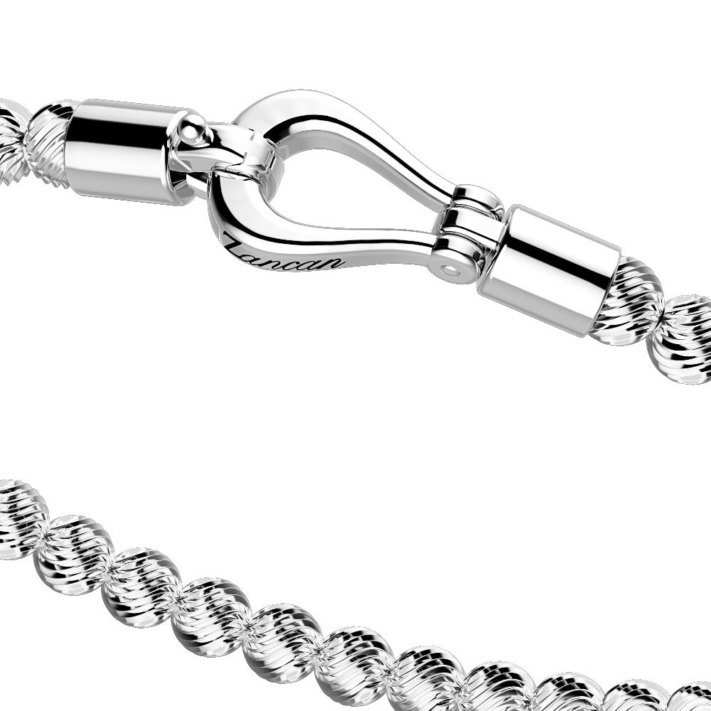 Bracciale in argento con sfere striate e chiusura gioiello.
