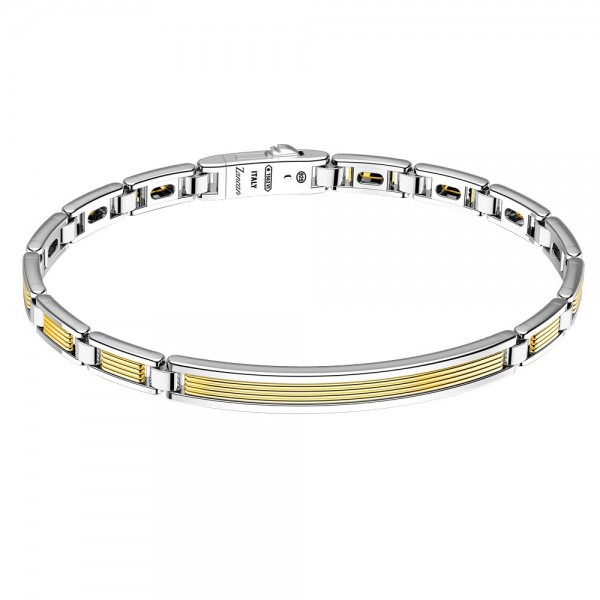 Gold and silver bracelet with plaque.