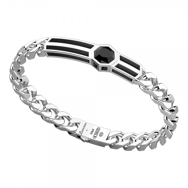 Silver groumette bracelet with central texture and hexagonal onyx stone.