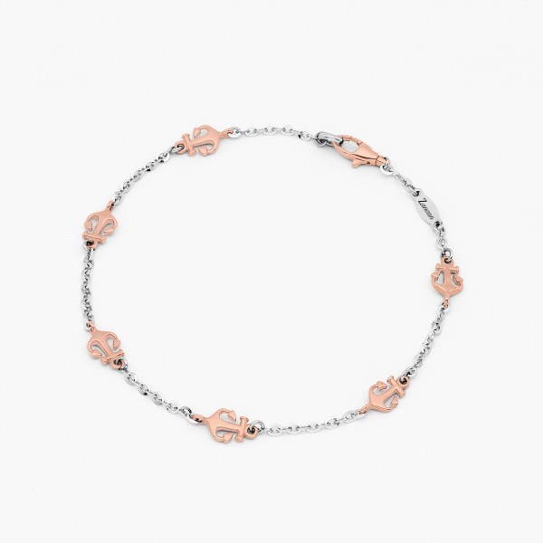 Bracelet in white gold and anchor detail in rose gold.